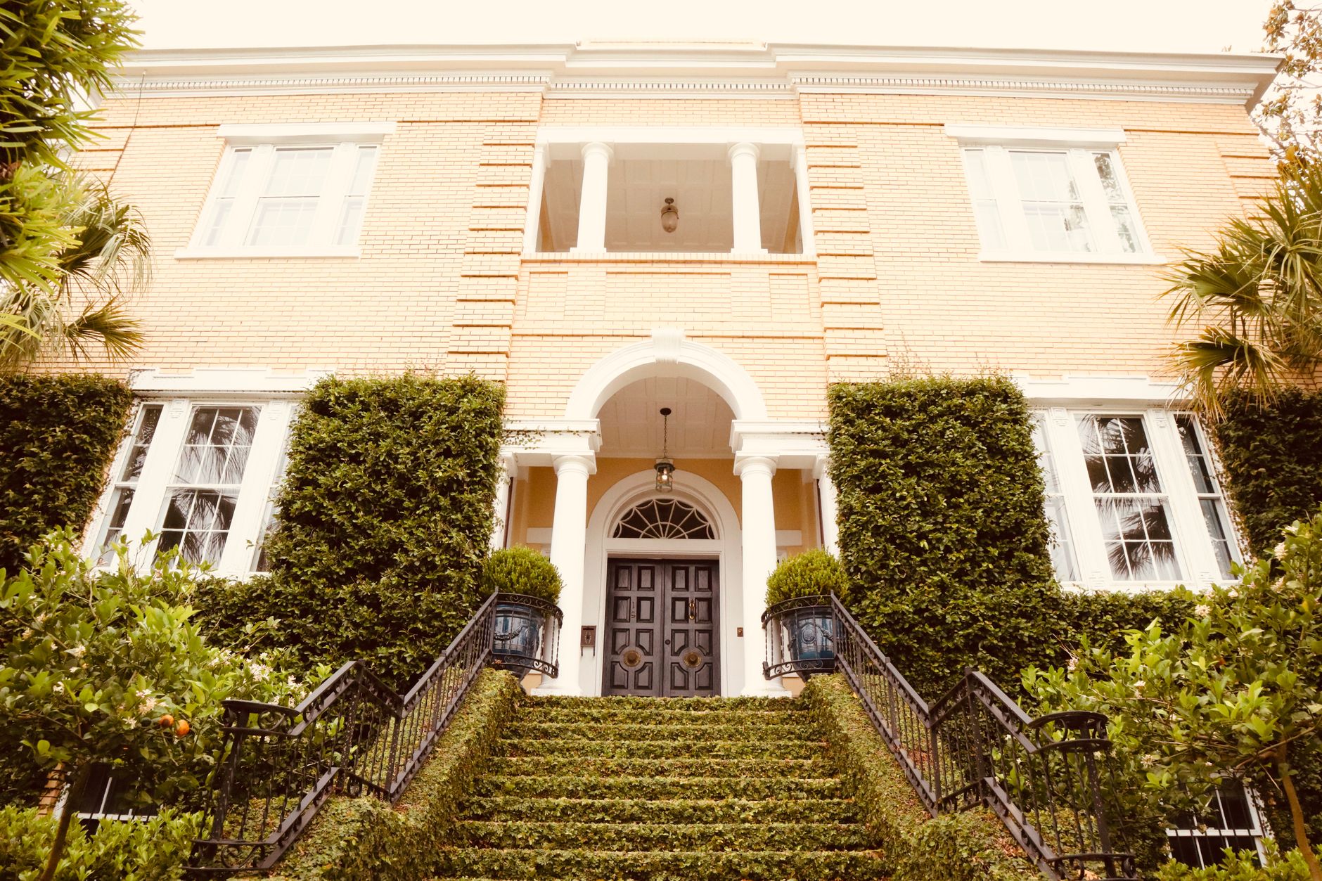 Southern home with ornamental iron railings